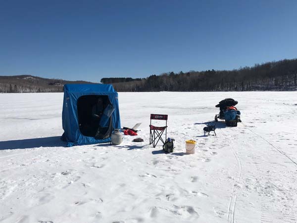 people ice-fishing on Upson Lake